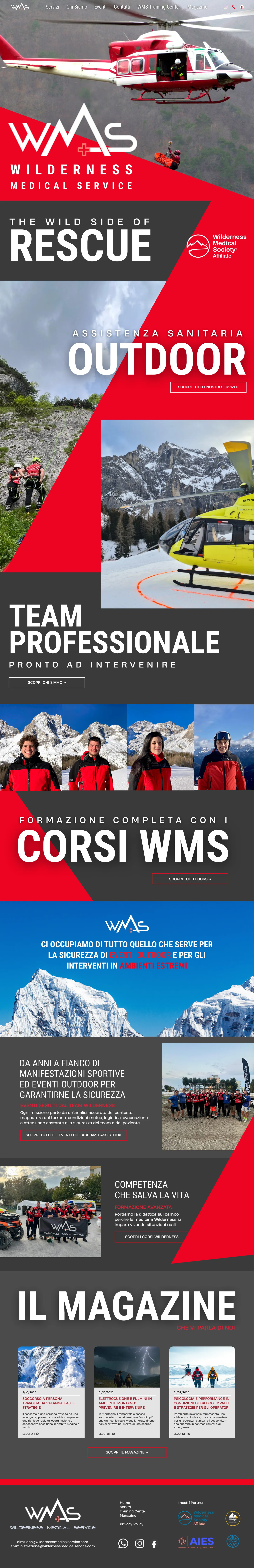 Apertura del sito Wilderness Medical Service: elicottero di soccorso in volo sopra la montagna e il marchio WMS